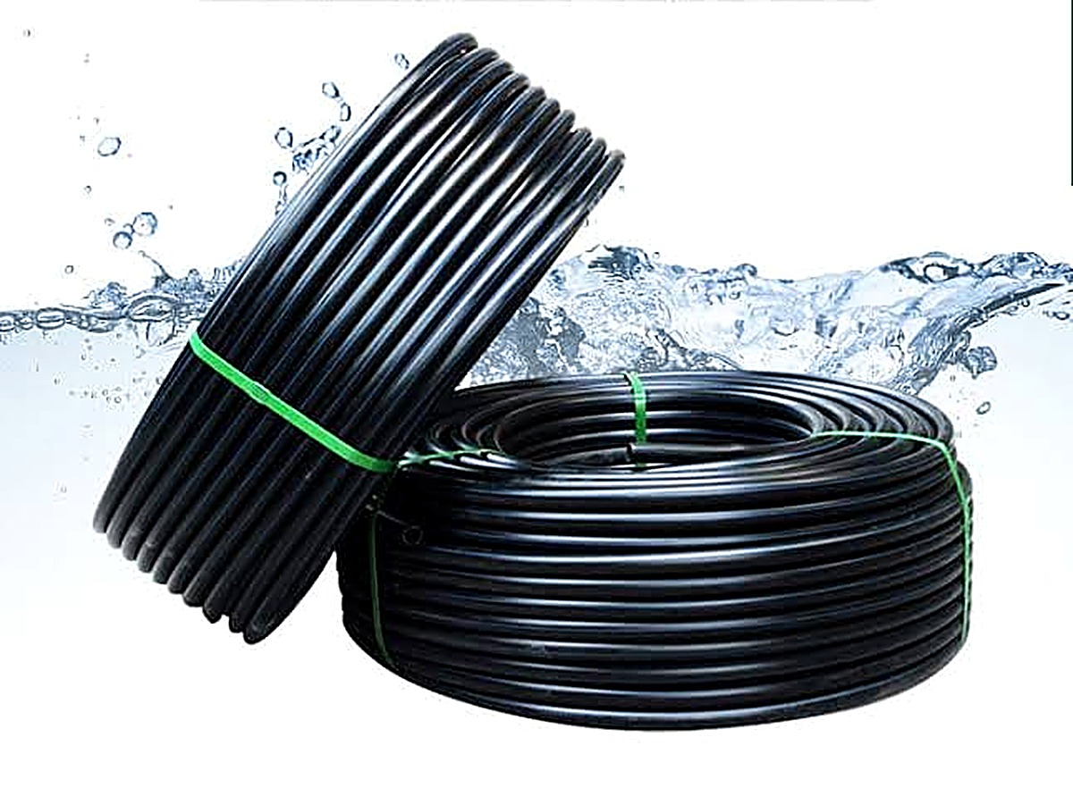 Coils of black HDPE drip irrigation pipe